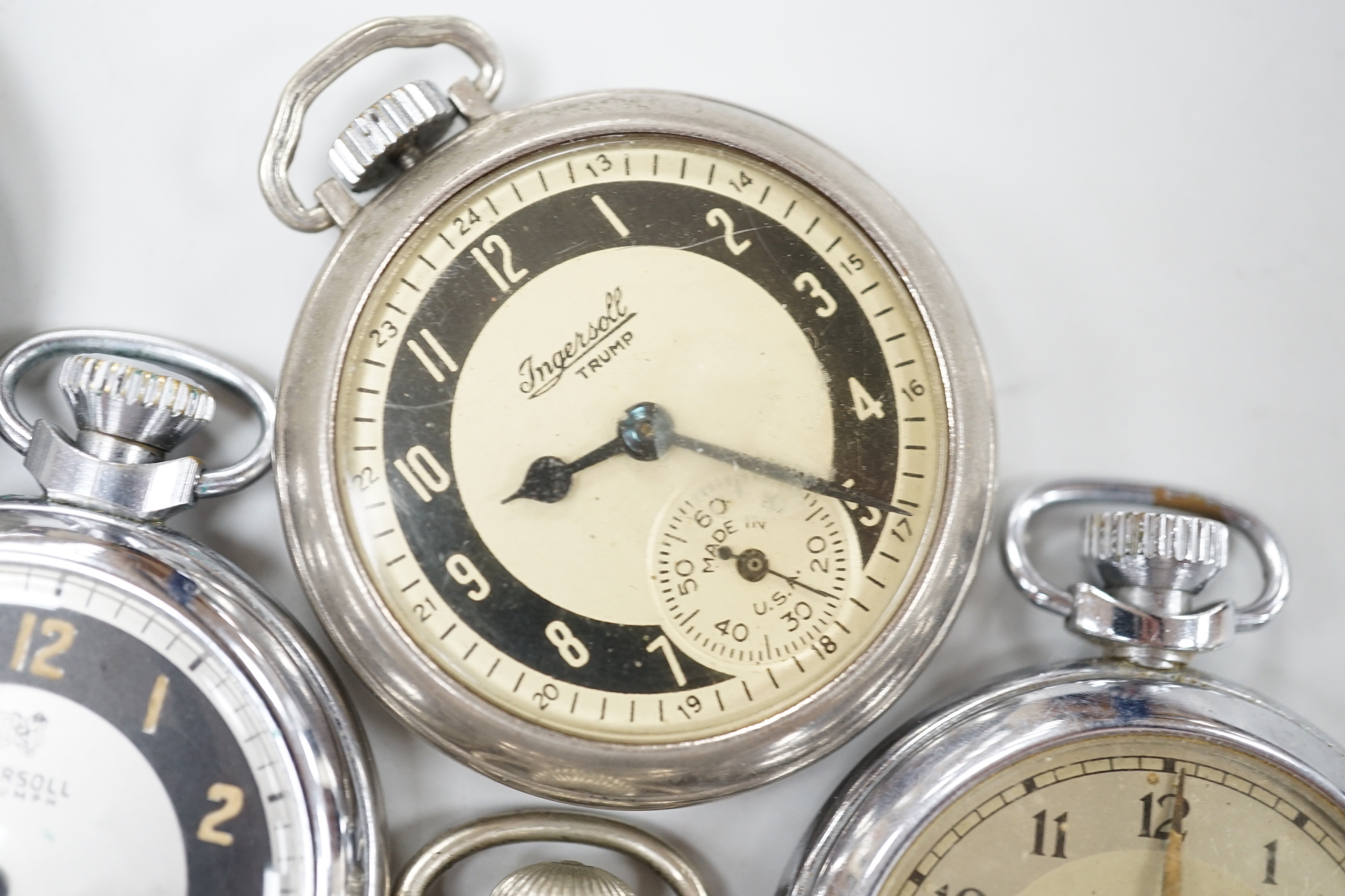 Ten assorted base metal pocket watches including Ingersoll and Smiths.